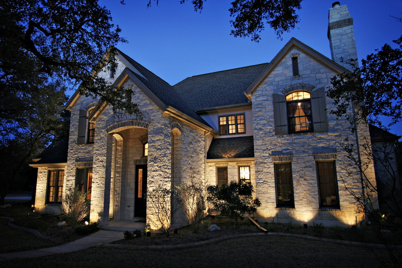 Wall grazing light highlighting stone texture