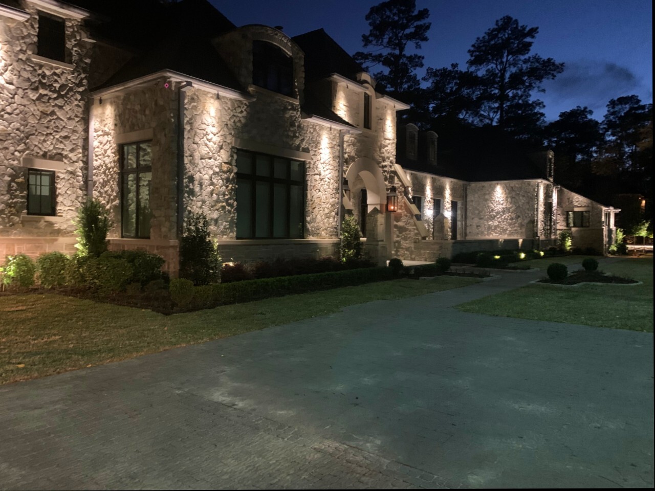 Downlighting on a covered porch and entryway