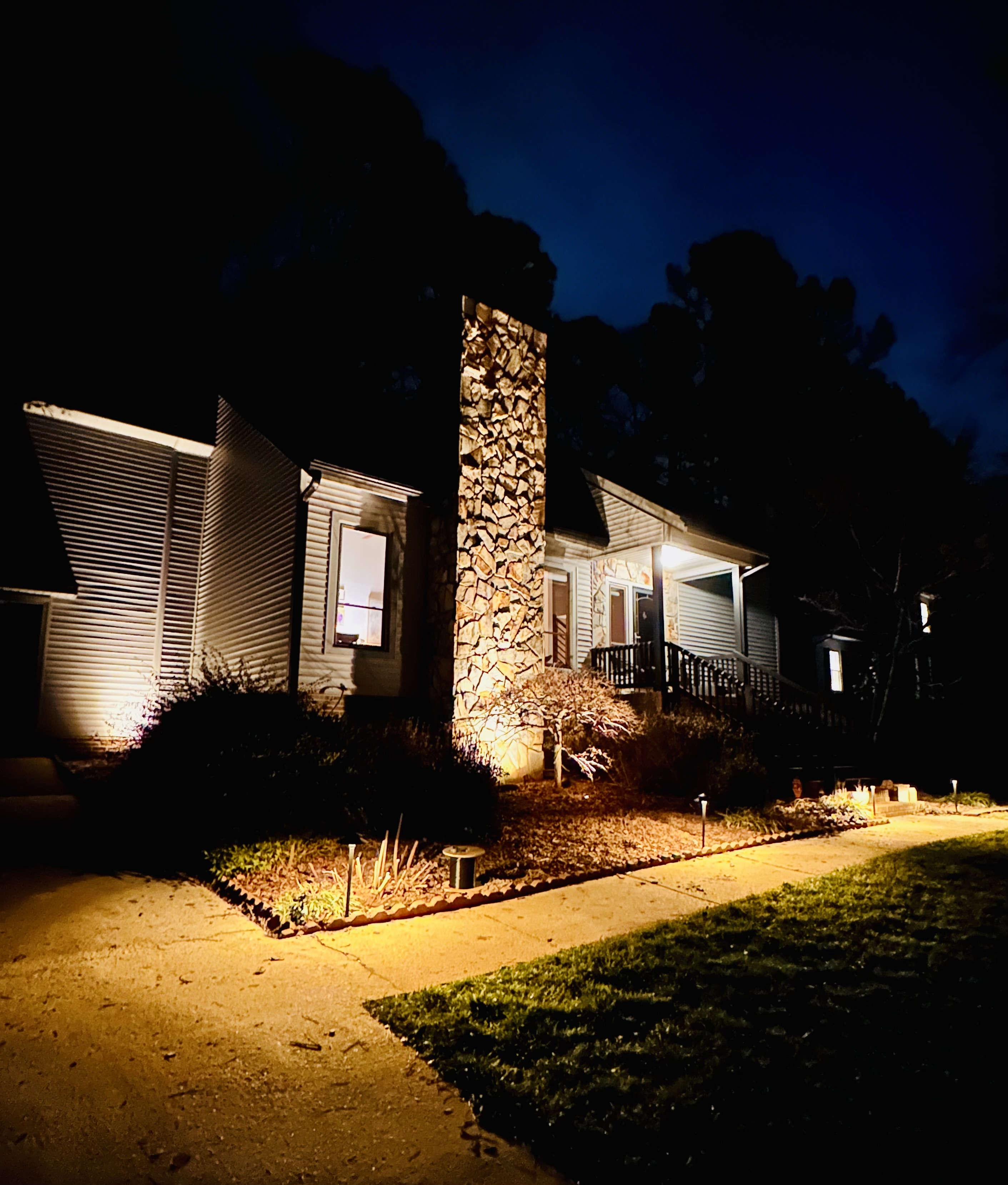 Front pathway lighting, stone chimney home in Raleigh