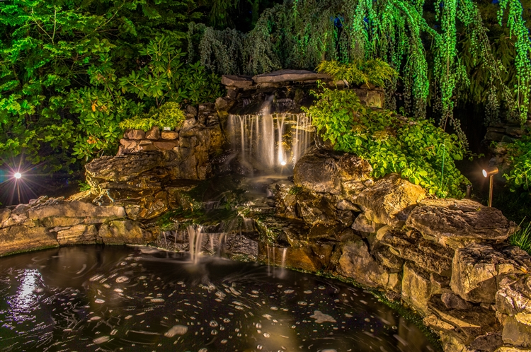 Water feature and waterfall lighting at night